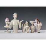 Half-dolls: a Art Deco lady with silver bobbed hair and hands held out from the front of her