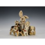 Post-war Steiff rabbits and dogs: jointed Niki Rabbit - 91?4in. (23.5cm.) high; two Arco standing