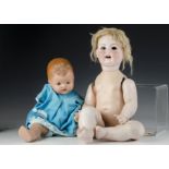 A large Porzellanfabrik Mengruth 914 character baby, with brown sleeping eyes, blonde mohair wig and