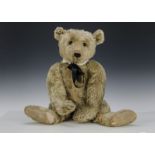 A large early Steiff Teddy Bear circa 1910, with blonde mohair, black boot button eyes, pronounced
