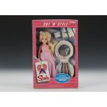 A Pedigree Cut ‘N’ Style Sindy, No.42005, 1985, with blonde ‘Special Hair’, pink dress, in