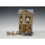 A small German blue roof dolls’ house probably Gottschalk, wood covered in printed paper with