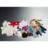 A quantity of Sindy clothes: including trousers, tops, dresses, sweat shirts and Pink ‘n’ Frilly