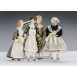 Four German bisque shoulder-head dolls’ house dolls, one in original nanny outfit with full bisque