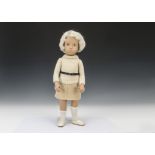 A Trendon Sasha doll Blonde Sweater, 112, with short blonde hair, corduroy skirt, jumper, shoes