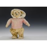 A rare large Chiltern Skater Teddy Bear, 1930s, with blonde artificial silk plush head, backs of