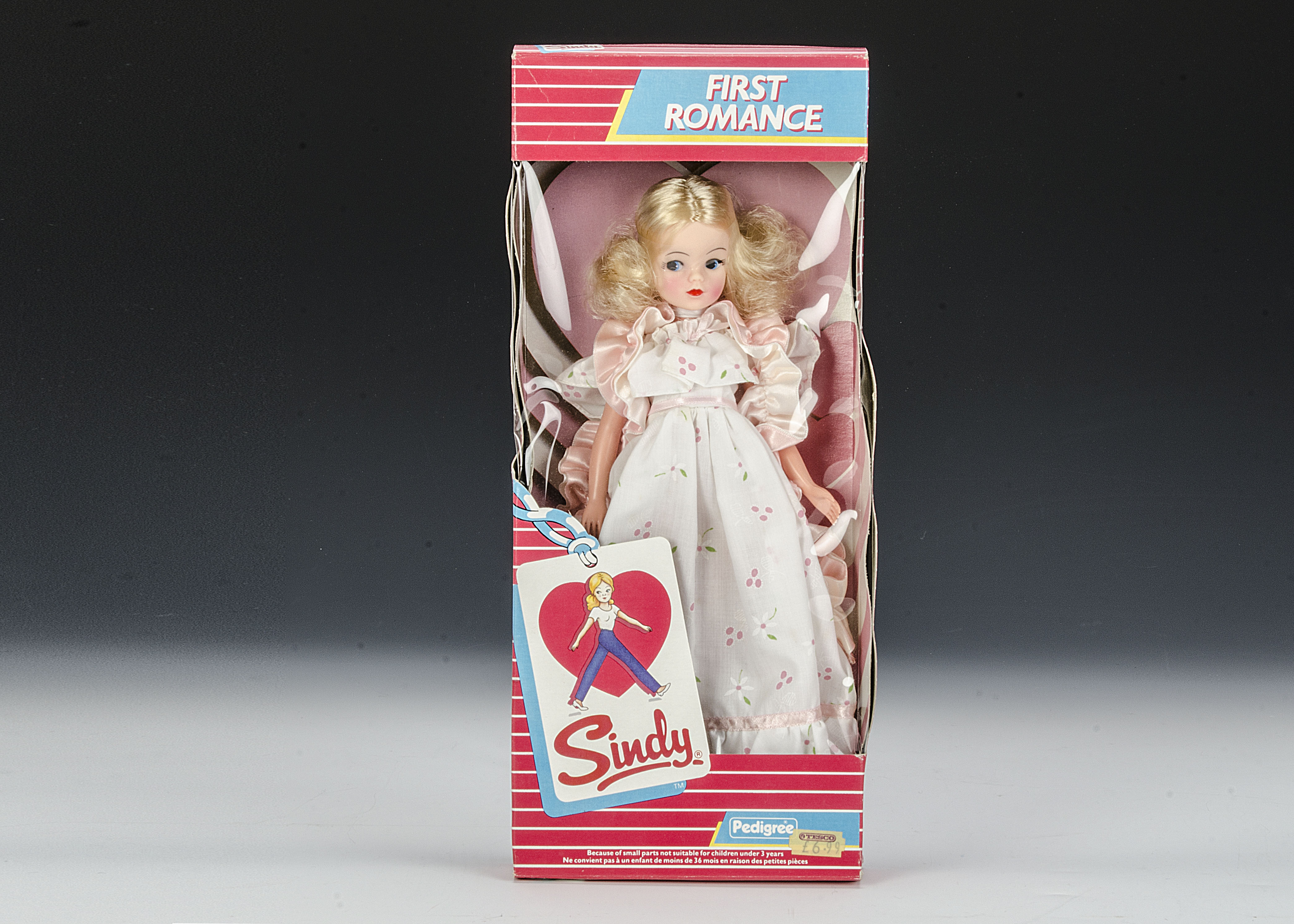 A Pedigree First Romance Sindy, No.42019, 1985, with blonde hair, pale pink floral print dress, in