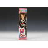 A Pedigree Miss Sindy, No.42008, with auburn hair and black and white zebra print dress, in original