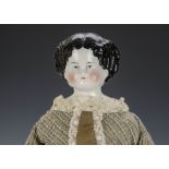 A china shoulder head doll No.9, with blue painted eyes, black painted centrally parted hair with