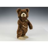 A rare Steiff Teddy Baby with unusual closed mouth, 1930s, with brown mohair, clear and black