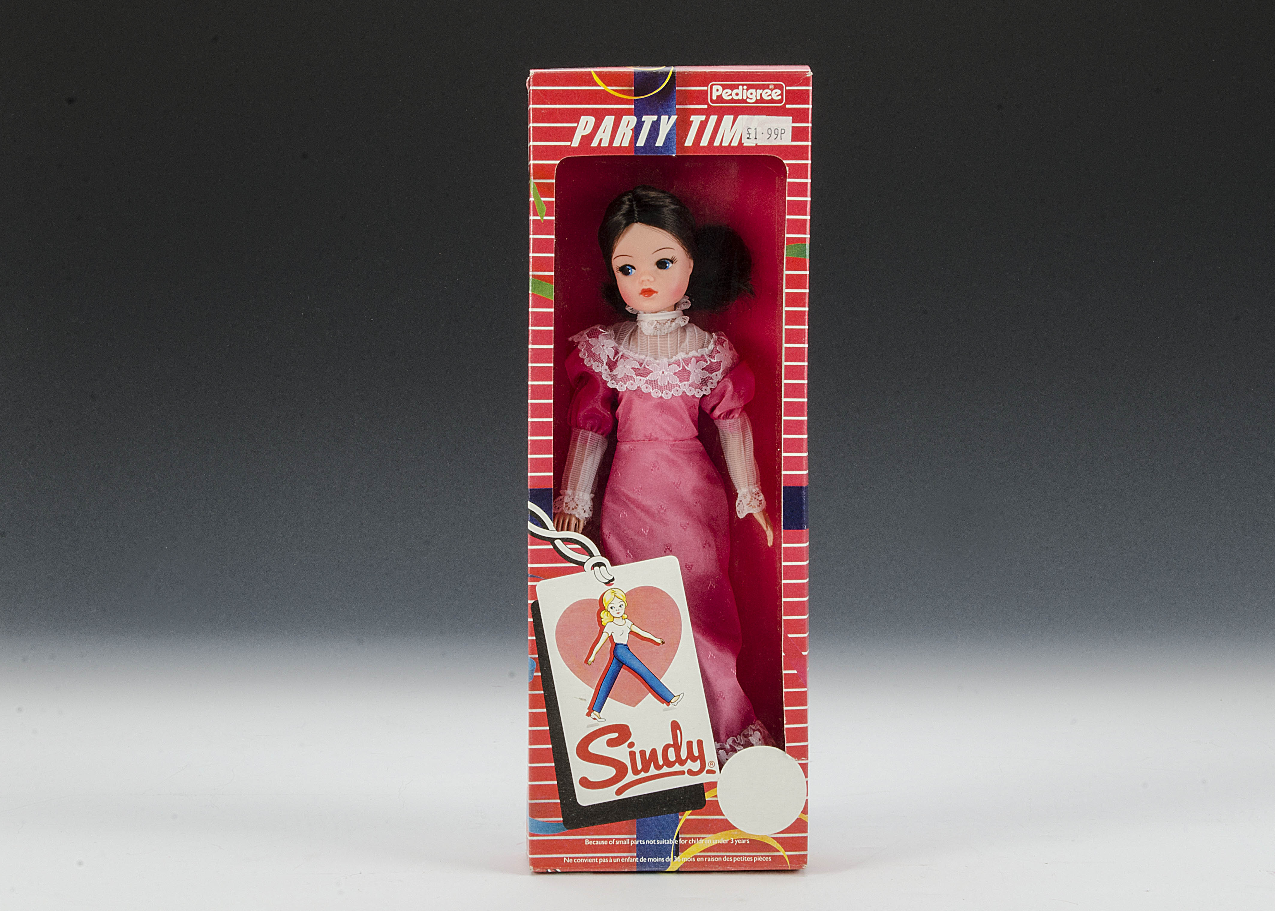 A Pedigree Party Time Sindy, No.42006, with brunette hair, long pink dress with lace trim, in