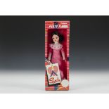 A Pedigree Party Time Sindy, No.42006, with brunette hair, long pink dress with lace trim, in