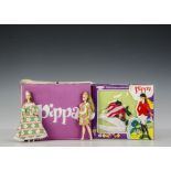 Palitoy Pippa: two dolls, on with jointed knees, both in floral dresses; a Tally Ho! Outfit, in