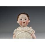 A Porzellanfabrik Mengersgereuth 914 character baby, with blue sleeping eyes, brown mohair wig,