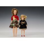 An Ideal Tammy and Pepper, Tammy with brunette hair, tartan skirt, red cord top, gold belt and