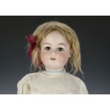 An Armand Marseille 390 child doll, with brown sleeping eyes, blonde brown sleeping eyes, jointed