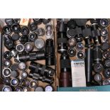 Lenses: a variety of optics including Pentax, Minolta and Canon with many others (2 Trays)