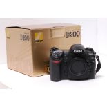 Nikon D200 Camera Body: in makers box with charger, manuals and disc