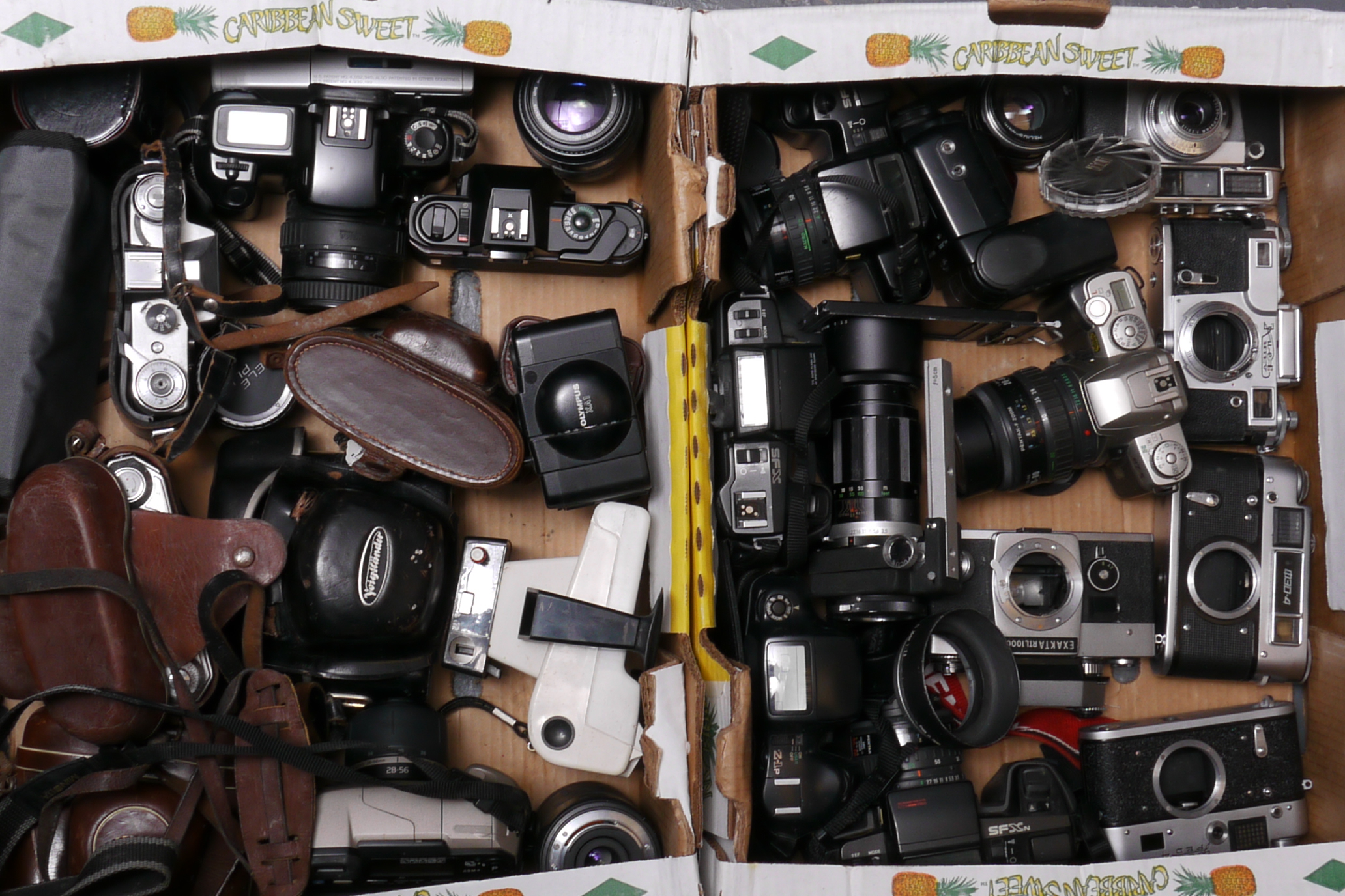 Cameras and lenses: an assortment of Russian, German and other items (2 trays)