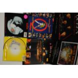 Books & 7" Vinyl, twelve 'Freddie Mercury Tribute', two 'A Magic Tour' plus other books together