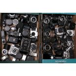 Cameras and lenses: a variety of cameras and lenses including Topcon, Pentax and Canon items (2