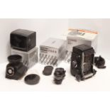 Mamiya C330S Camera, with 80mm lenses and Cds meter head, all in makers boxes