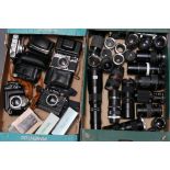 Cameras & Lenses: an Olympus 35 SP with others and a variety of lenses (2 Trays)