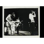 Led Zeppelin, six photographs stage shot, four with Pennie Smith and two with Sandy McGregor