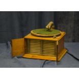 Hornless gramophone: a Cinch hornless, early model with metal grille, now with Gramophone Co.