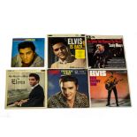 Elvis Presley, eleven albums including Christmas album, Loving You 10", Elvis Back, His Hand In Mine