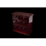 Two vintage small collectors chests, one modelled as a miniature chest of drawers, the other in
