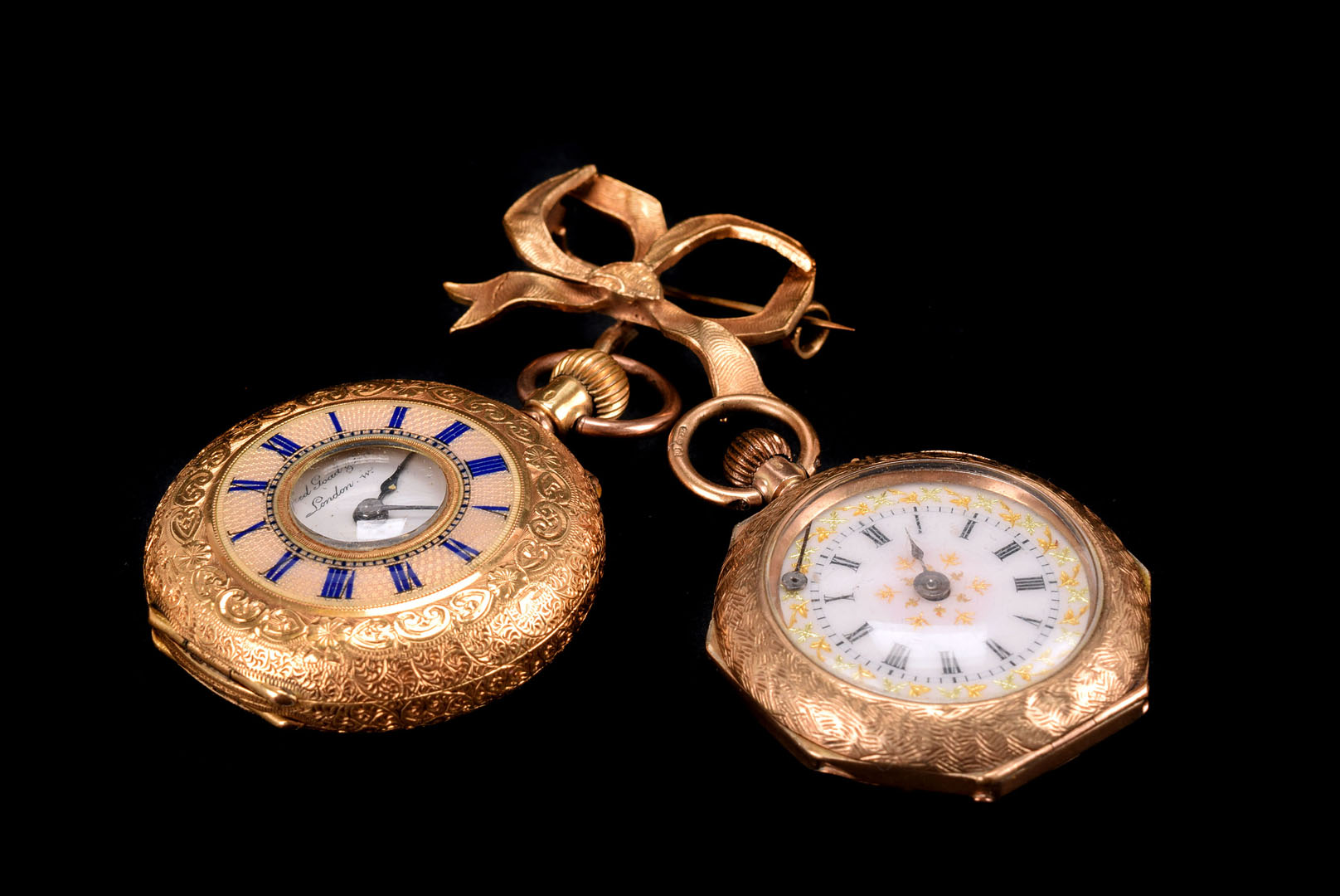 A 9ct gold ladies fob watch, by Alfred Goad & Sons, having engraved case with blue enamel Roman