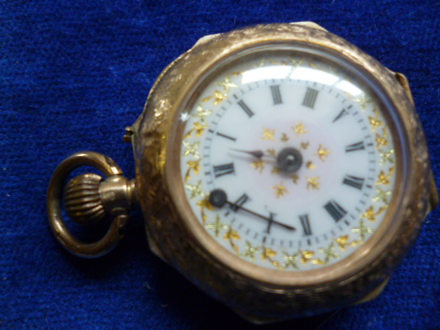 A 9ct gold ladies fob watch, by Alfred Goad & Sons, having engraved case with blue enamel Roman - Image 8 of 12