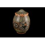 An Art Deco Bosch Freres pottery ginger jar and cover, in muted colours with three medallions of