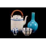 A collection of Oriental ceramics, including a turquoise sprinkler vase, Japanese tea bowl, modern
