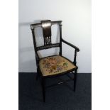 An Edwardian mahogany bedroom chair, having upholstered seat and inaid backsplat