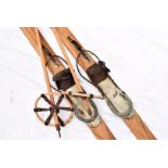 A pair of vintage wooden alpine skis, by Erbacher, together with a pair of vintage stocks (4)