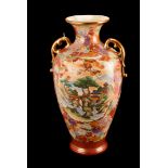 A large ovoid Satsuma vase, decorated with central landscape, surrounded by flowers, heightened in