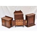 A small oak cased collectors chest, together with an oak smokers cabinet, a candle box and a small