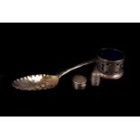 An earlly 19th century silver berry spoon, by ET, together with a George V silver salt with blue