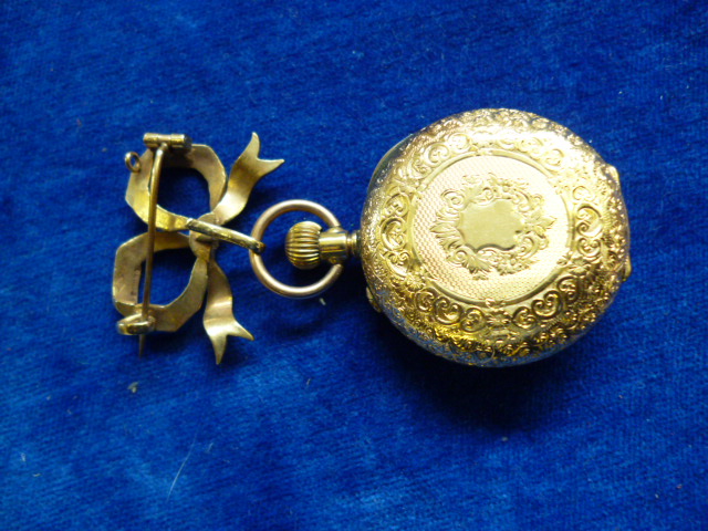 A 9ct gold ladies fob watch, by Alfred Goad & Sons, having engraved case with blue enamel Roman - Image 7 of 12