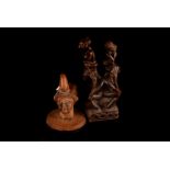 Two Tribal Congolese carved wooden figures, one a ceremonial group with father and mother supporting