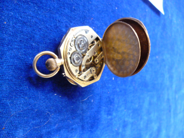 A 9ct gold ladies fob watch, by Alfred Goad & Sons, having engraved case with blue enamel Roman - Image 11 of 12