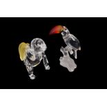 Six Swaroski crystal figures of animals, including a monkey with bananna, a toucan, seahorse and two