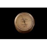 A vintage US ship's barometer by Friez, in brass case, marked to dial with United States Maritime