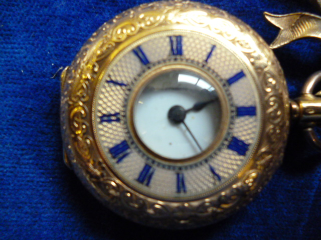 A 9ct gold ladies fob watch, by Alfred Goad & Sons, having engraved case with blue enamel Roman - Image 3 of 12