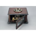 A rare E C Reynaud mahogany-cased coin-operated Praxinoscope Musical Box, with B H Abrahams eight-