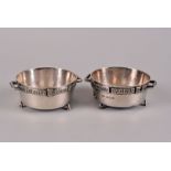 A pair of Edward VII hand raised table salts by Frederick James Ross, London 1903, bearing he