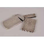 A Victorian silver card case by George Unite & Sons, with ivy leaf pattern around central floral