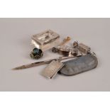An unusual collection of silver, and other items, including two silver sweet shaped pill boxes, a